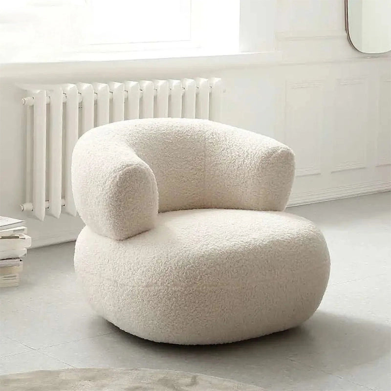 Sculpted bouclé lounge room chair with single chair form and armchairs for living room styling