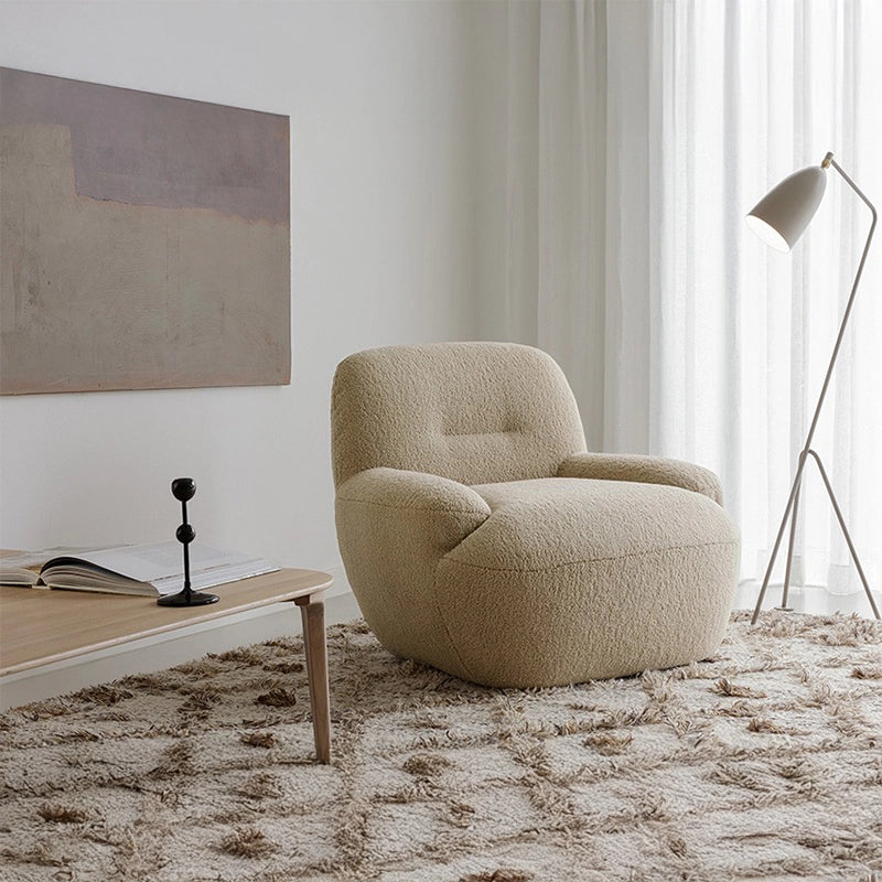 Rounded silhouette with cloud-like seat – lounge room chair + sofa armchair – ivory boucle