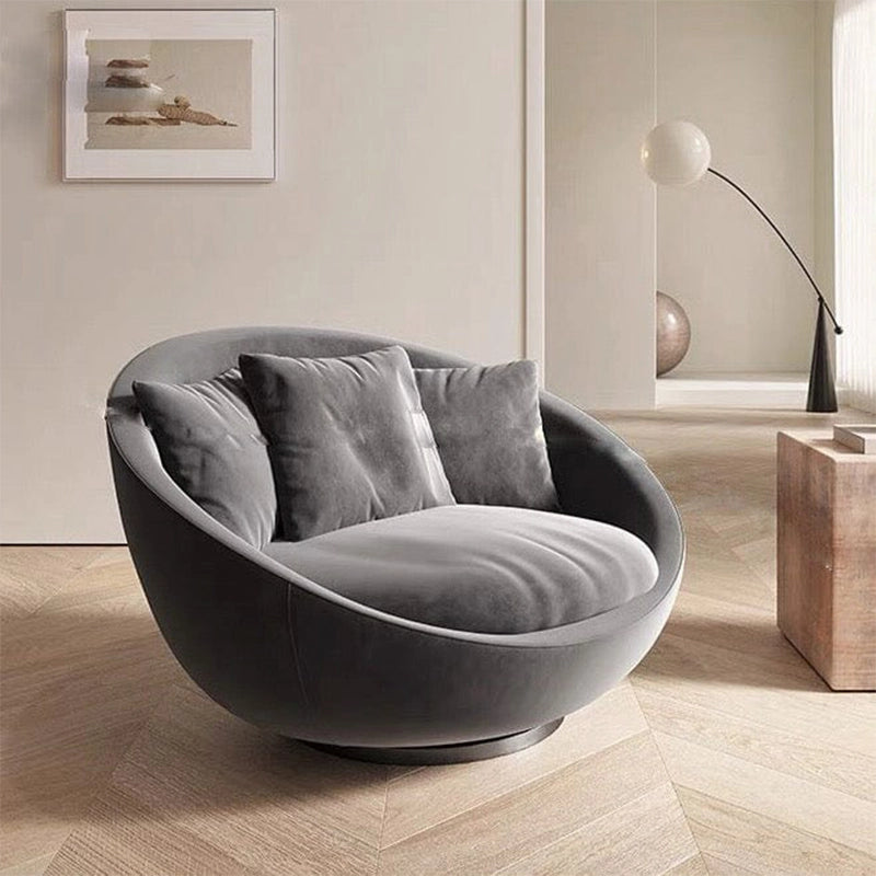 Plush circular lounge design with velvet fabric + reading armchair + comfort chair