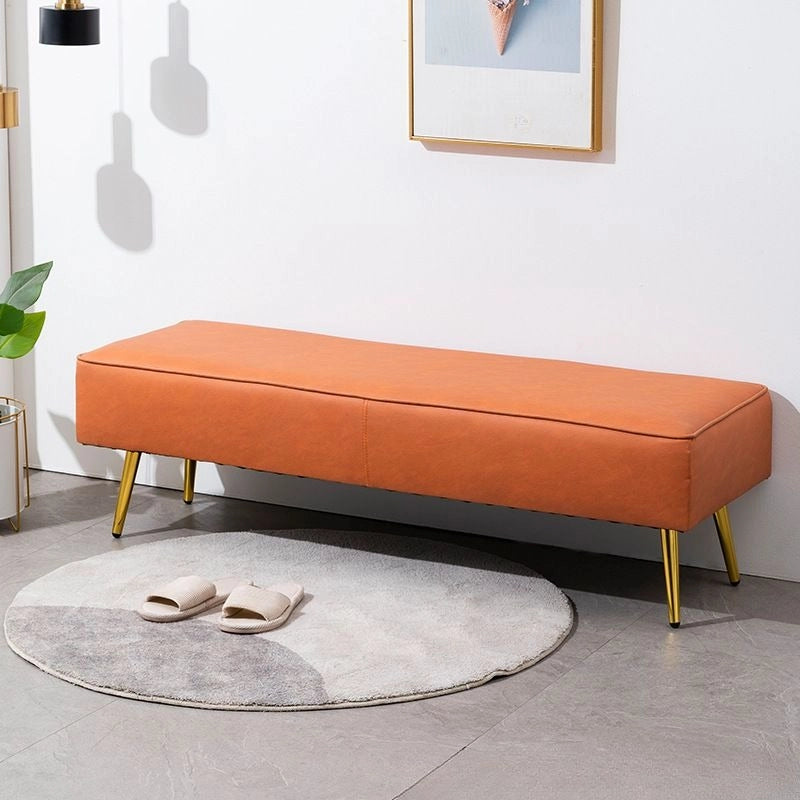 Gold leg design on upholstered bench seating; bed bench + dining table bench