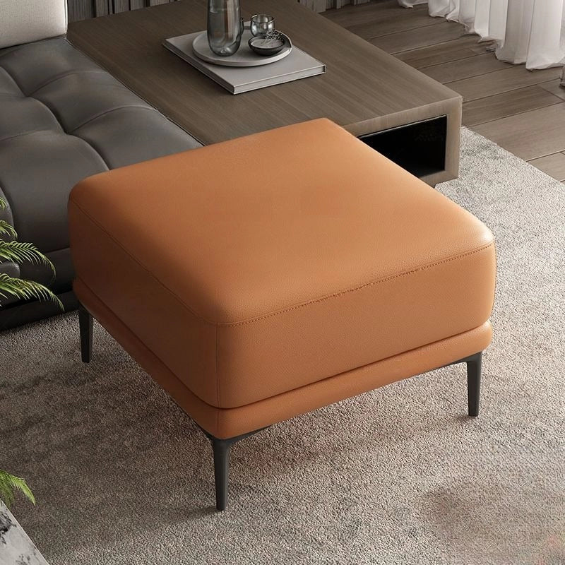 Sleek square ottoman image with living room ottoman and ottoman keywords in tan faux leather