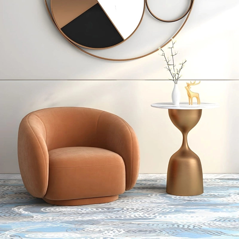 Rounded camel-toned lounge chair with hidden base – reading armchair, sofa chair