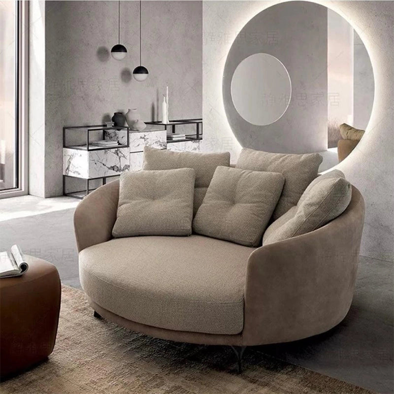 Rounded lounge chair image with reading armchair and comfort chair in cream fabric