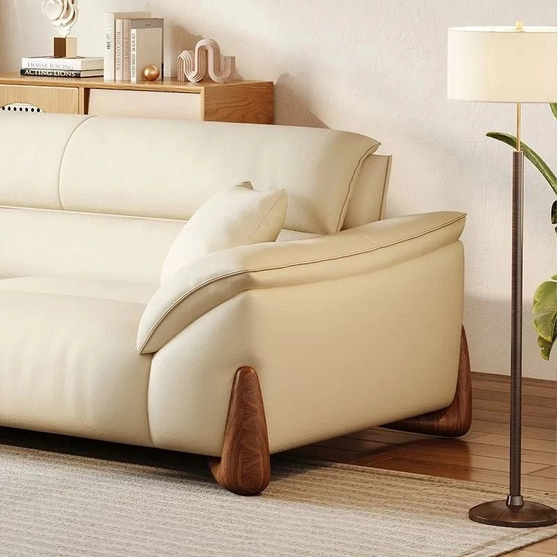 Cream leather couch with curved arms and lumbar back – design of sofa, premium sofa, leather
