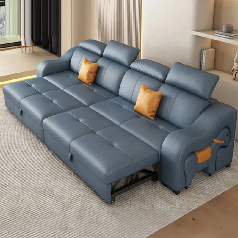Tufted cushions with sculpted armrests | sofa cum bed design | black matte legs | navy