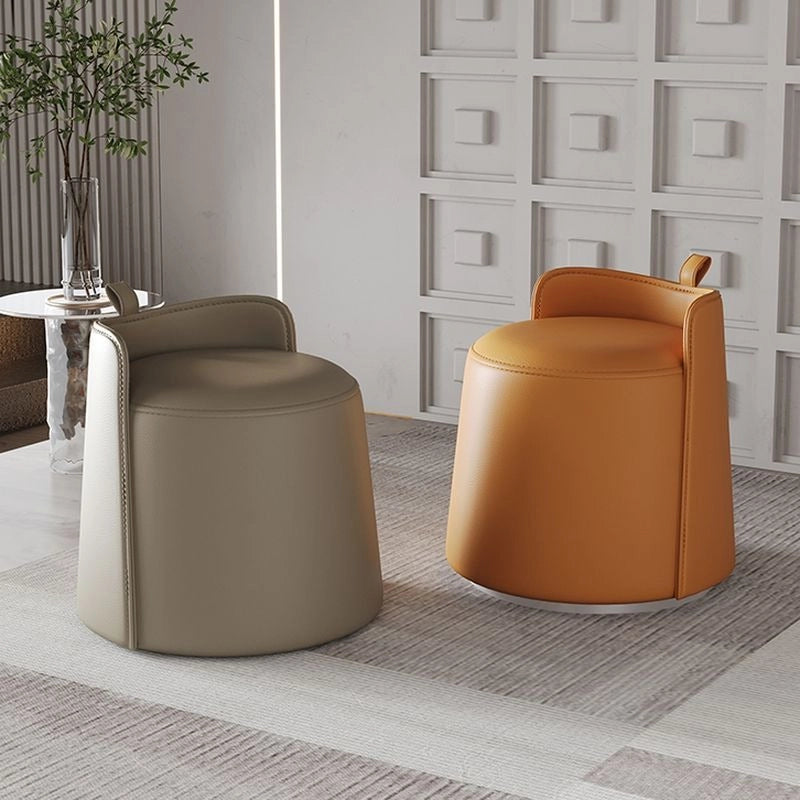 Taupe faux leather finish on compact footstool, pouf seat, living room ottoman
