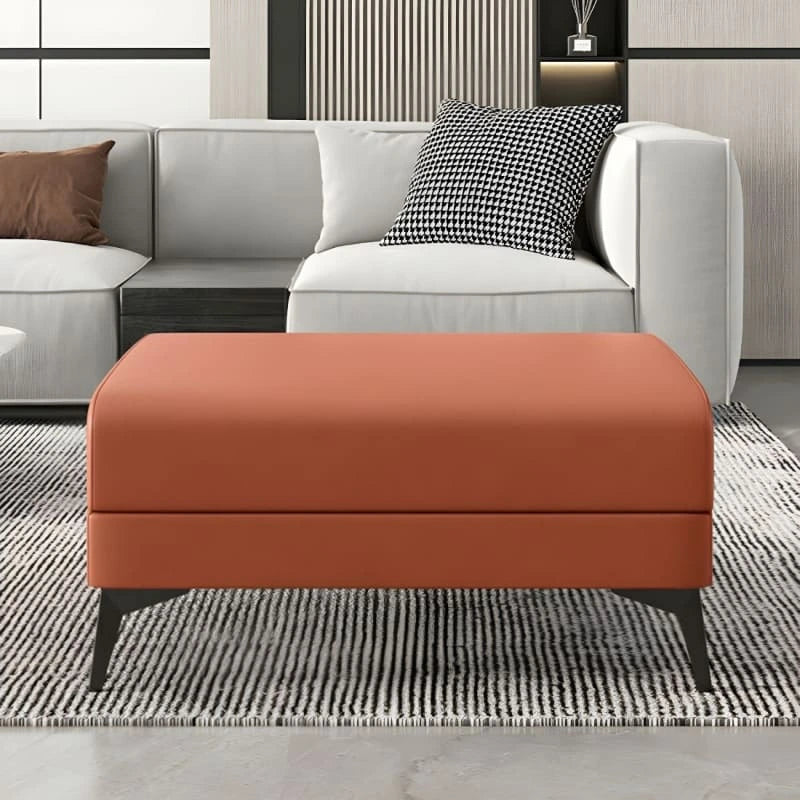 The Luno ottoman stool from Kate and Mark is a modern rectangular piece crafted for urban homes seeking minimal luxury.