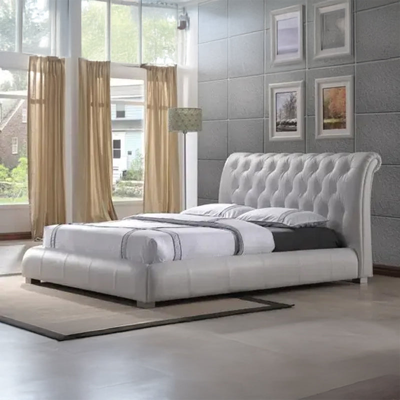 Renlor upholstered bed with king size bed comfort, deep button tufted sleigh headboard, faux leather upholstery and elegant master bedroom styling