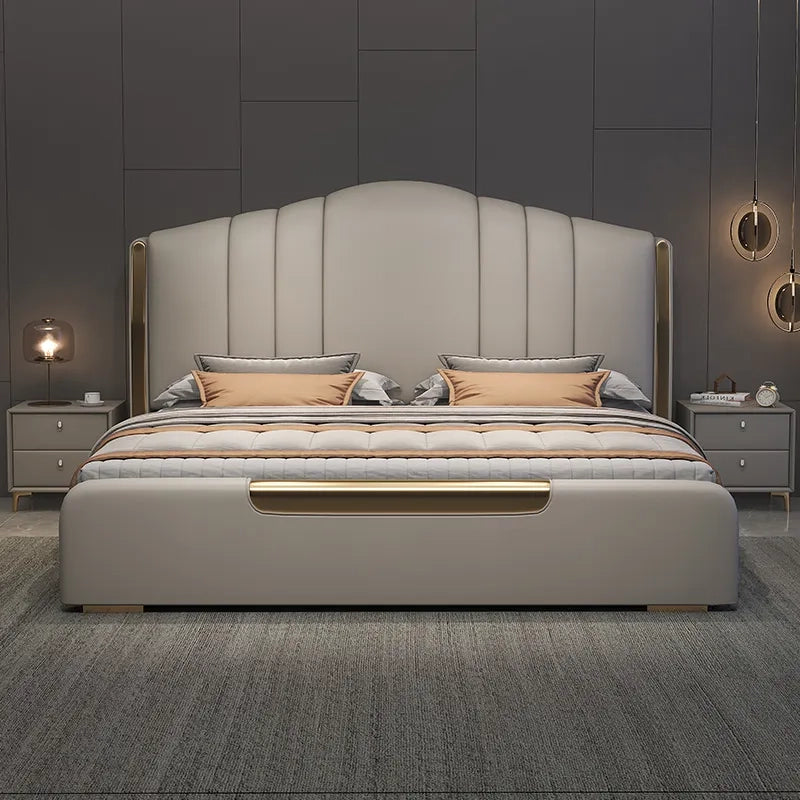 King size upholstered bed with hydraulic bed storage, gold trim accents, wingback headboard and premium leatherette upholstery for modern bedrooms