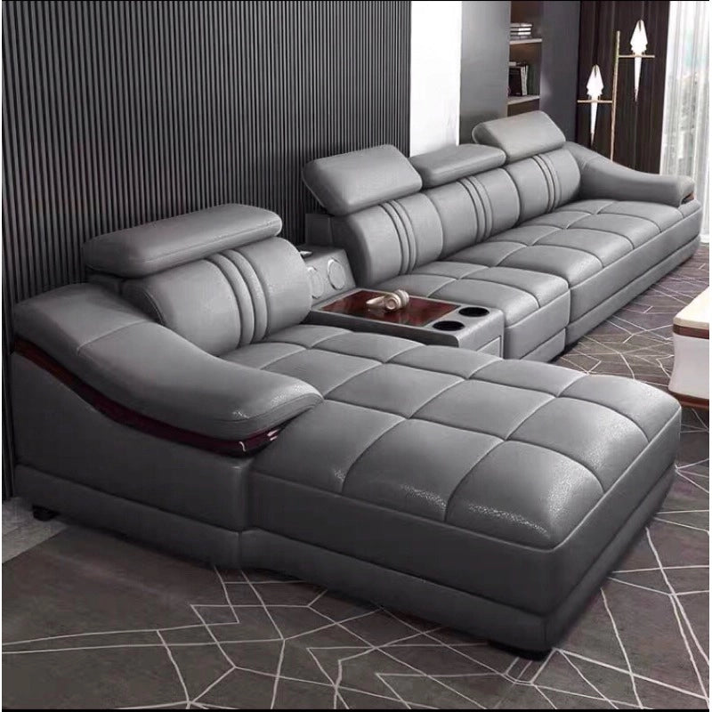 Adjustable headrests on Phoenix L shape sofa set with navy leatherette finish, modern sofa design and corner couch layout