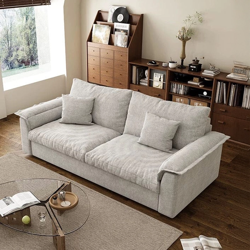 Rion sofacumbed with light grey fabric upholstery, convertible sofa bed design, 3-seater settee layout and practical sofa to bed functionality for modern homes