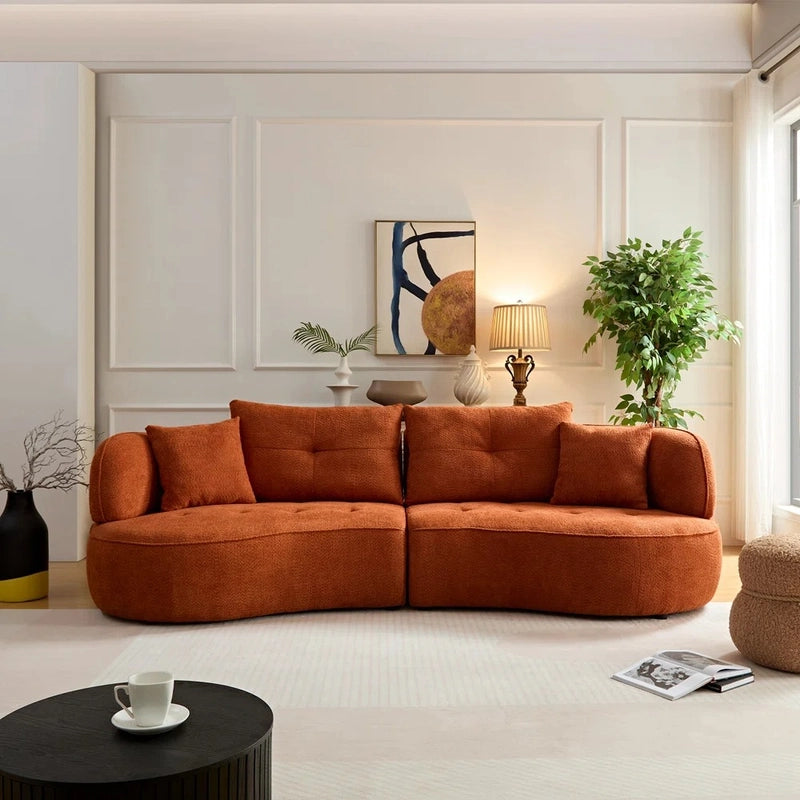 Front angle view of Selestial luxury sofa set with curved sofa silhouette, premium boucle fabric sofa upholstery, lounge sofa comfort and contemporary living room sofa styling