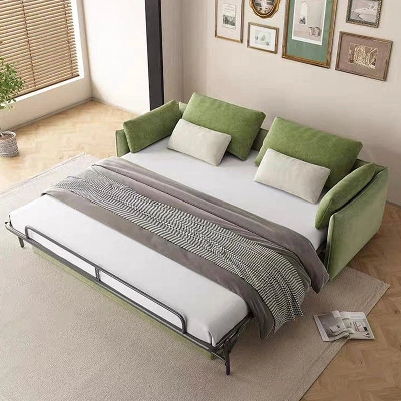 Left angle view of Toris olive green sofa cum bed with sofacumbed comfort, couch bed functionality, curved armrests, textured fabric upholstery and contemporary design