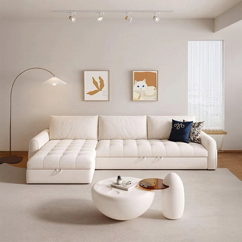Left angle view of Vesper sofa cum bed with pull out sofa bed mechanism, storage sofa cum bed functionality, concealed chaise storage and plush cushioned seating