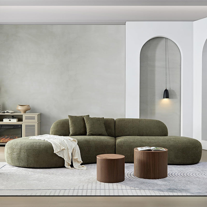 Front angle view of Sonnet luxury sofa in white bouclé fabric with couch set appeal, sofa set versatility, modern sofa styling and sculptural organic curved design