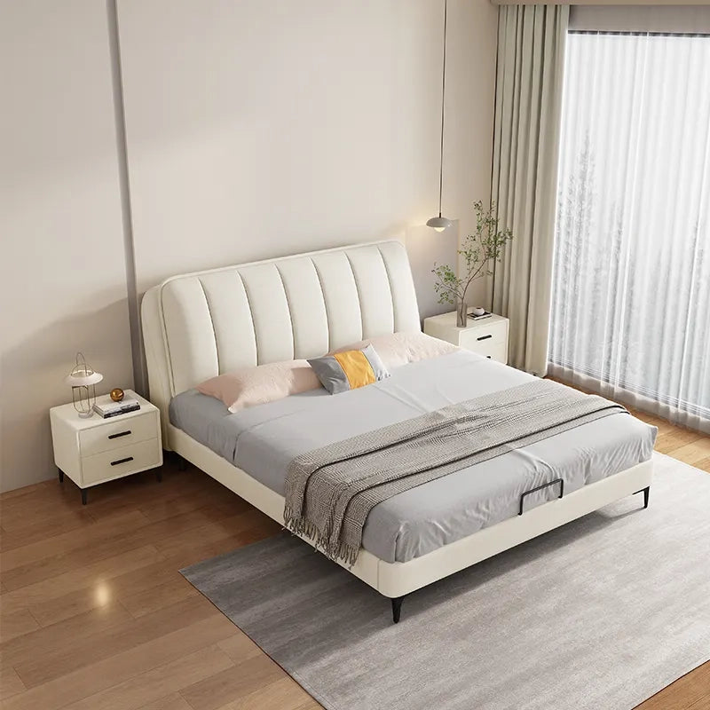 King size upholstered bed with vertically tufted headboard, low-profile platform frame and contemporary modern bed frame design