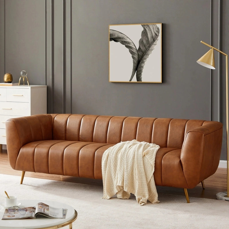 Left side view of Sabryn leather sofa showcasing luxury sofa comfort, leather couch upholstery, modern sofa design, vertical channel tufting and premium living room furniture styling