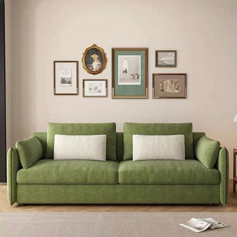 Toris olive green sofa cum bed converted into sleeping position showcasing sofa cam bed convenience, convertible sofa bed functionality and integrated foam mattress support