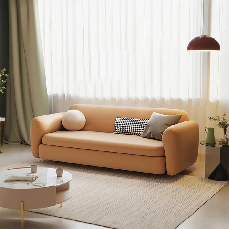 Side angle view of sofacumbed featuring sleeper sofa comfort, velvet sofa bed styling, rounded padded armrests and contemporary minimalist silhouette