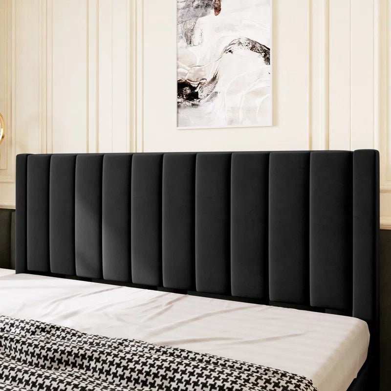 King size upholstered bed with modern cot design, vertical panel detailing, soft fabric finish and elegant contemporary bedroom styling