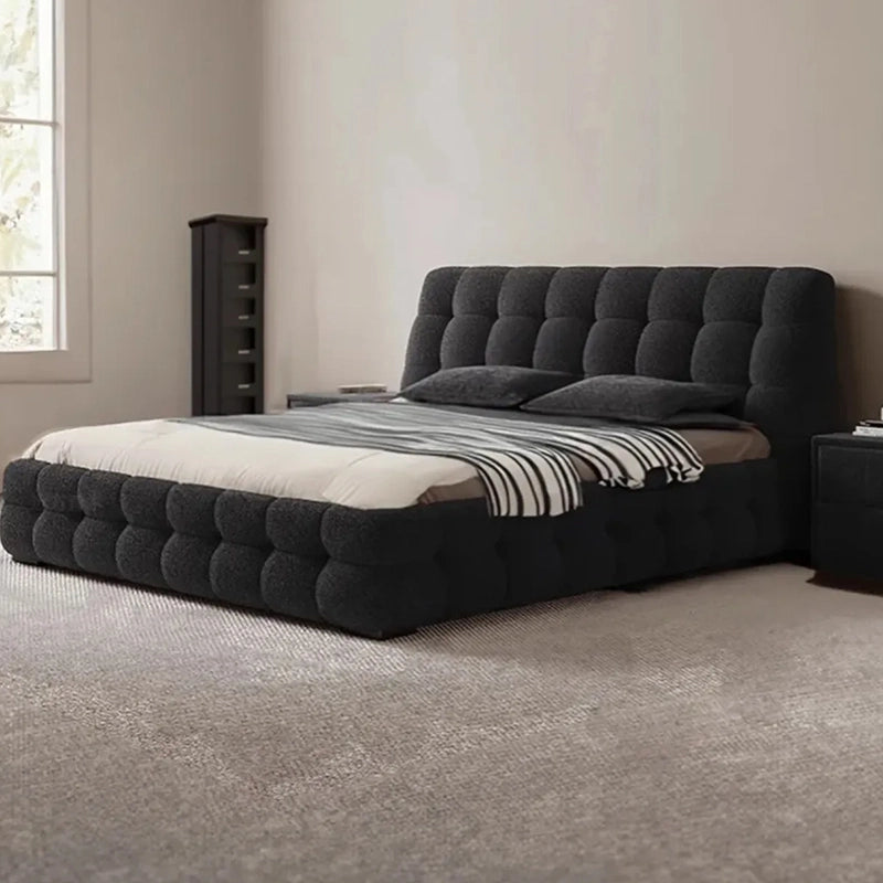 Hero view of Pelican luxury upholstered bed combining king size upholstered bed comfort, biscuit tufted detailing and elegant modern bedroom appeal