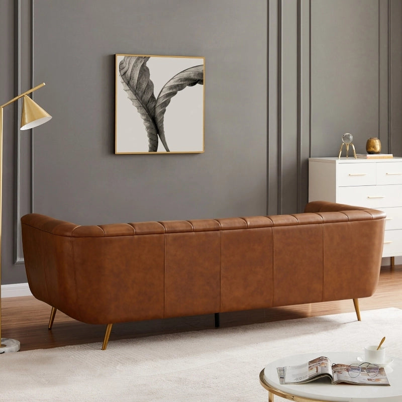 Top angle view of Sabryn luxury leather couch with premium leather sofa finish, brass tapered legs, modern sofa styling, sofa set versatility and elegant sofa design details