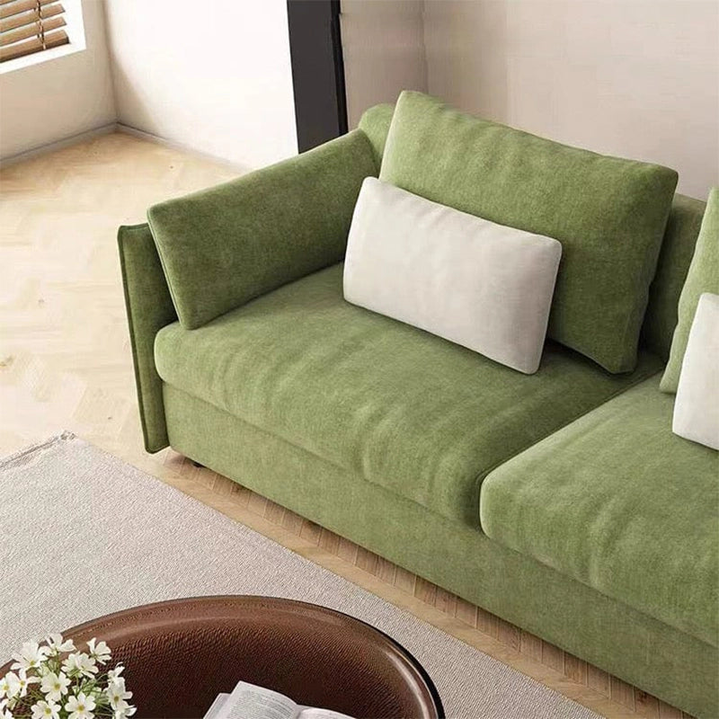 Modern living room view of Toris olive green sofa cum bed featuring sleeper sofa comfort, breathable fabric upholstery and elegant space-saving design