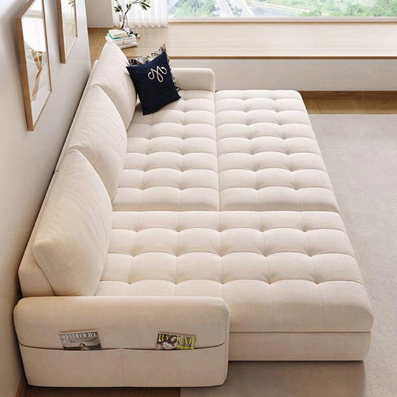 Close-up of Vesper sofa cumm bed showing sofa bed couch convenience, integrated side pocket storage and durable woven fabric upholstery