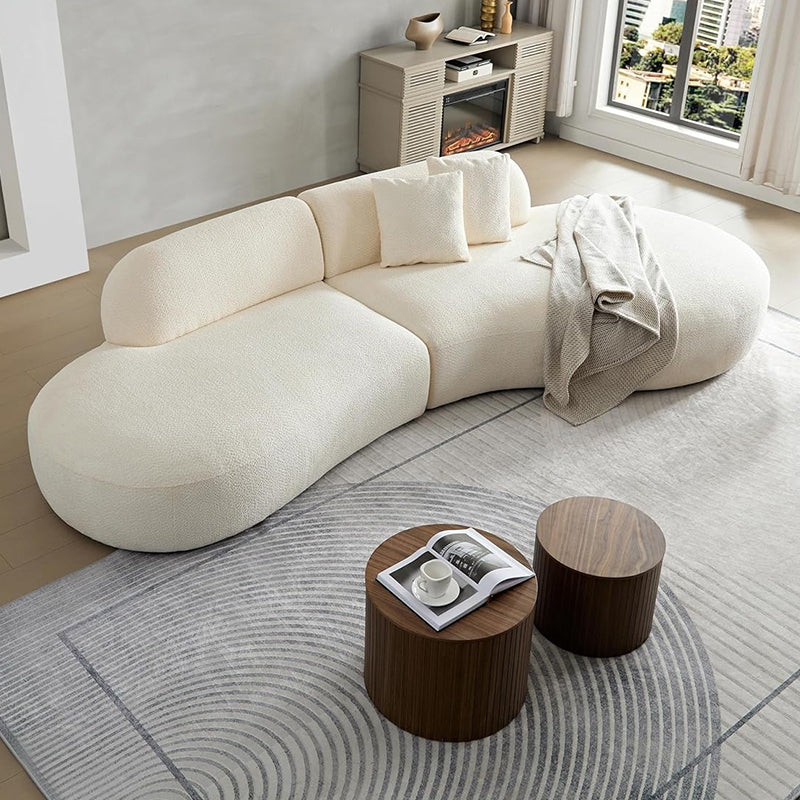 Top angle view of Sonnet luxury sofa in white bouclé fabric featuring set of sofa styling, couch set functionality, lounge sofa comfort and curved kidney bean silhouette