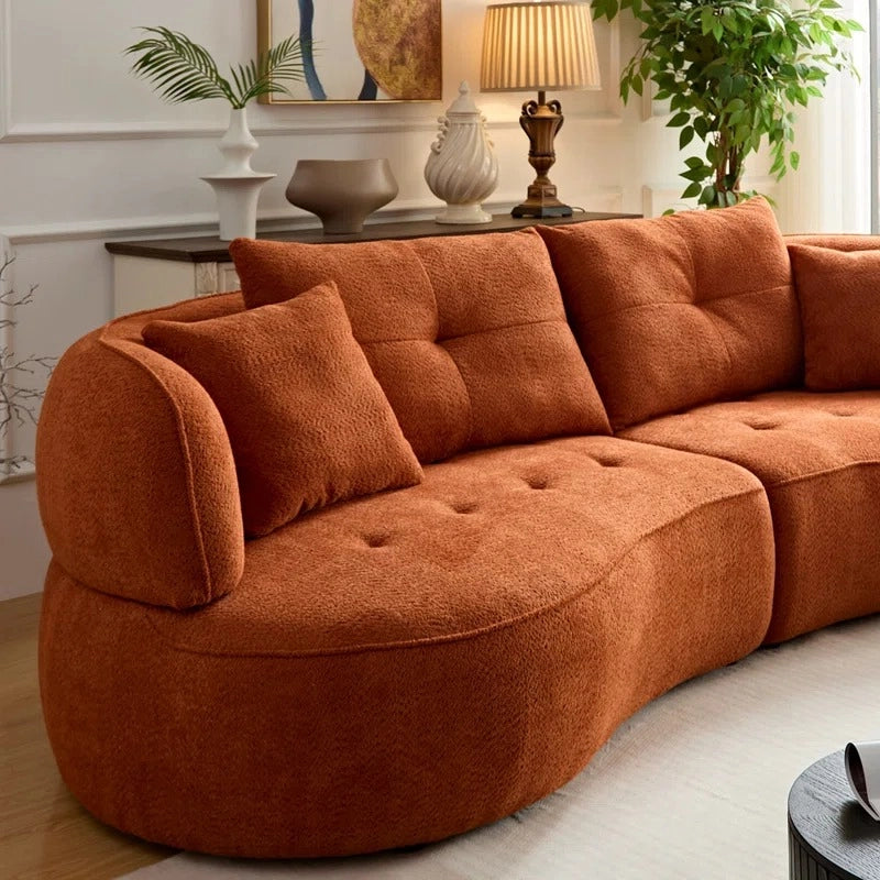 Corner perspective view of Selestial set of sofa featuring luxury sofa comfort, curved sofa styling, modern sofa aesthetics and sophisticated living room sofa design