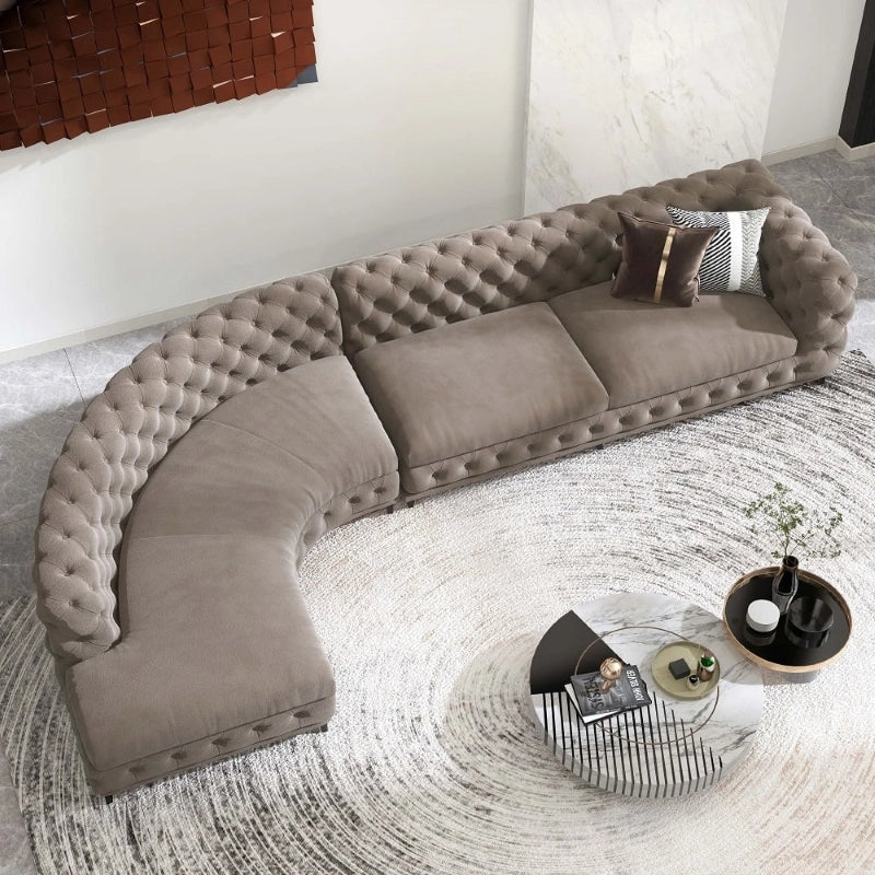 Polonium Chesterfield 5 seater sofa displayed in a luxury living room with L shape sofa set design, modern sofa appeal and premium velvet comfort