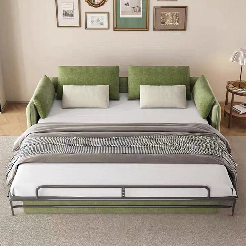 Close-up detail of Toris olive green sofa cam bed featuring couch bed comfort, matching bolster cushions, textured woven fabric and refined stitching details