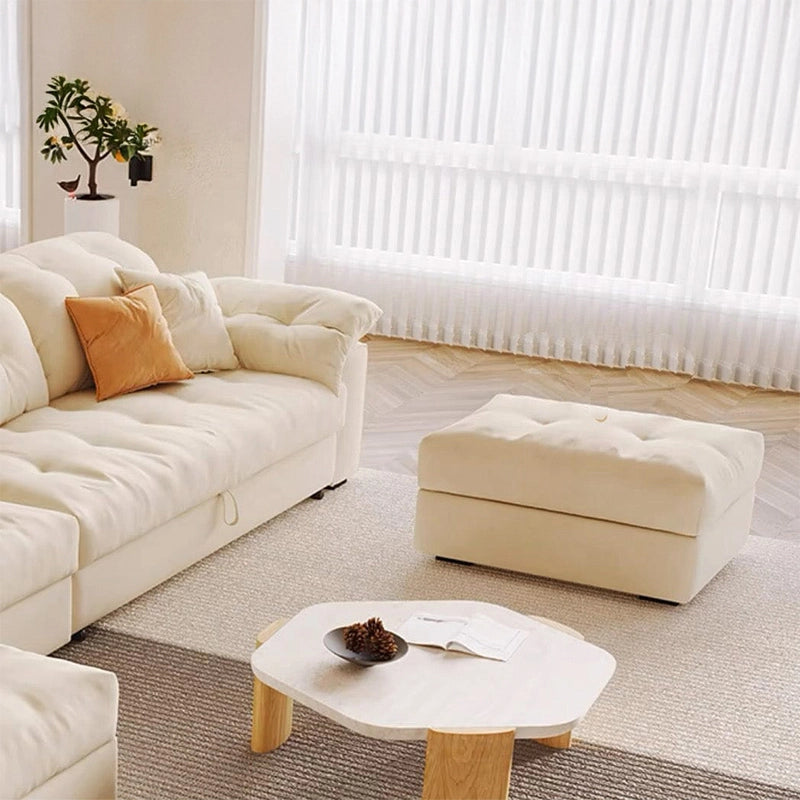 The 5-seater layout features a right-hand chaise that opens into a concealed storage unit, while a pull-out mechanism easily converts the couch into a full-size sleep surface. 