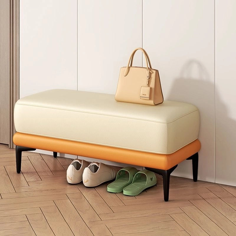 This two-seater bench also works as a sofa bench alternative or bedroom bench accent. Black tapered legs lend height and visual balance, echoing a floating effect. 