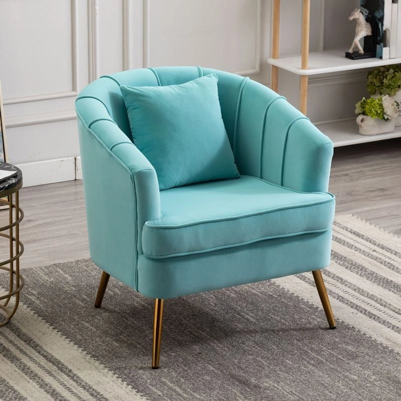 Upholstered in premium velvet or leatherette across vibrant tones, it fits right into compact layouts as a reading armchair or single sofa chair. 