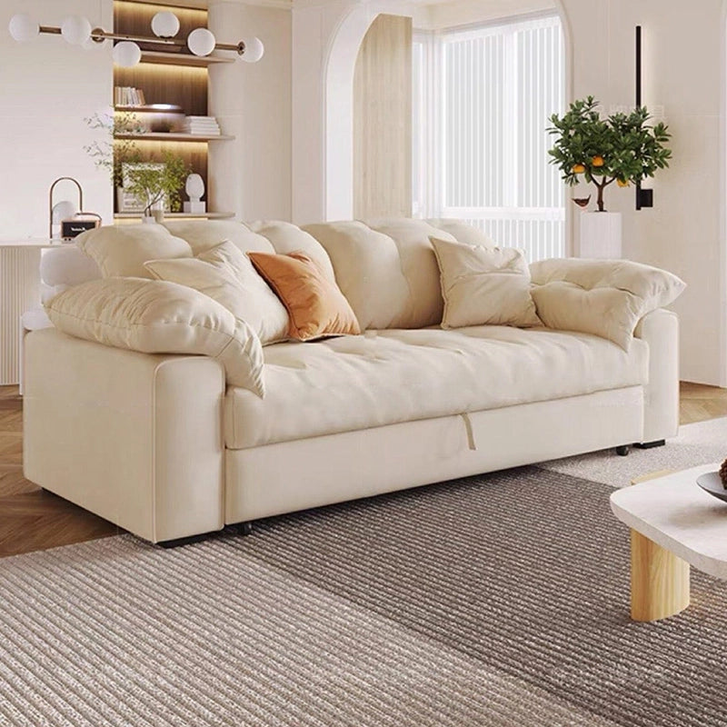 The button-tufted detailing, soft-touch beige fabric, and high-back design add visual warmth