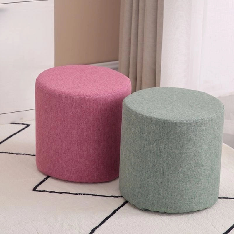The firm cushioned top and round profile provide versatile ottoman seating that suits apartment spaces, kids' rooms, or prayer nooks.