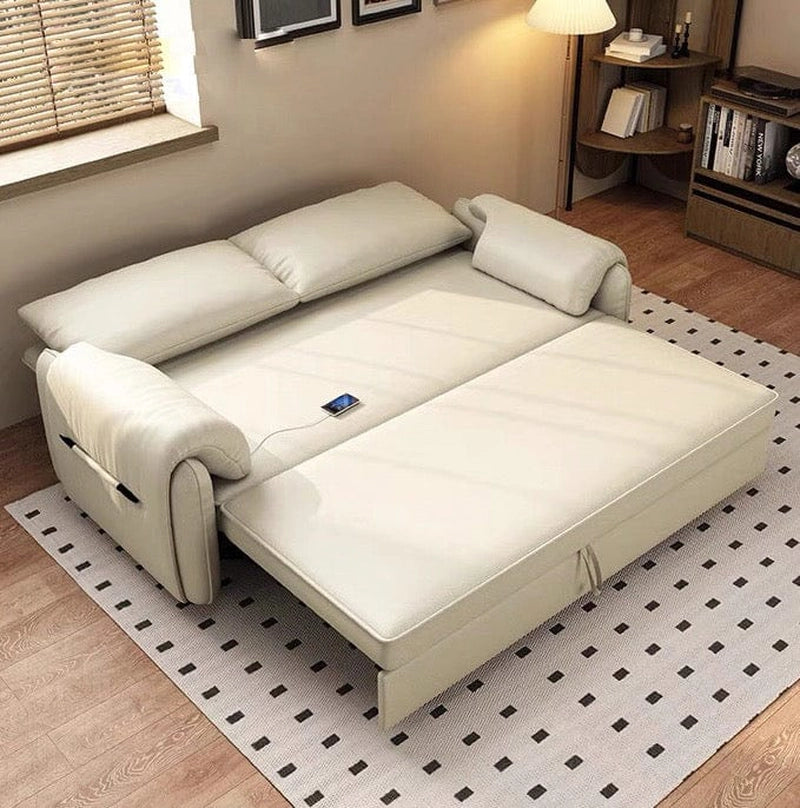 Upholstered in Nova fabric, this sofa cumm bed includes plush boxy seating, rounded arms, and a full-length pull-out section for easy transformation into a couch bed.