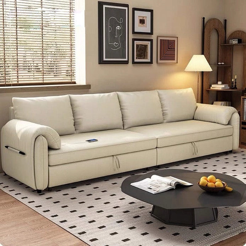 The L-shape configuration supports compact living with integrated side pockets, a hidden storage chaise, and a matching ottoman. 