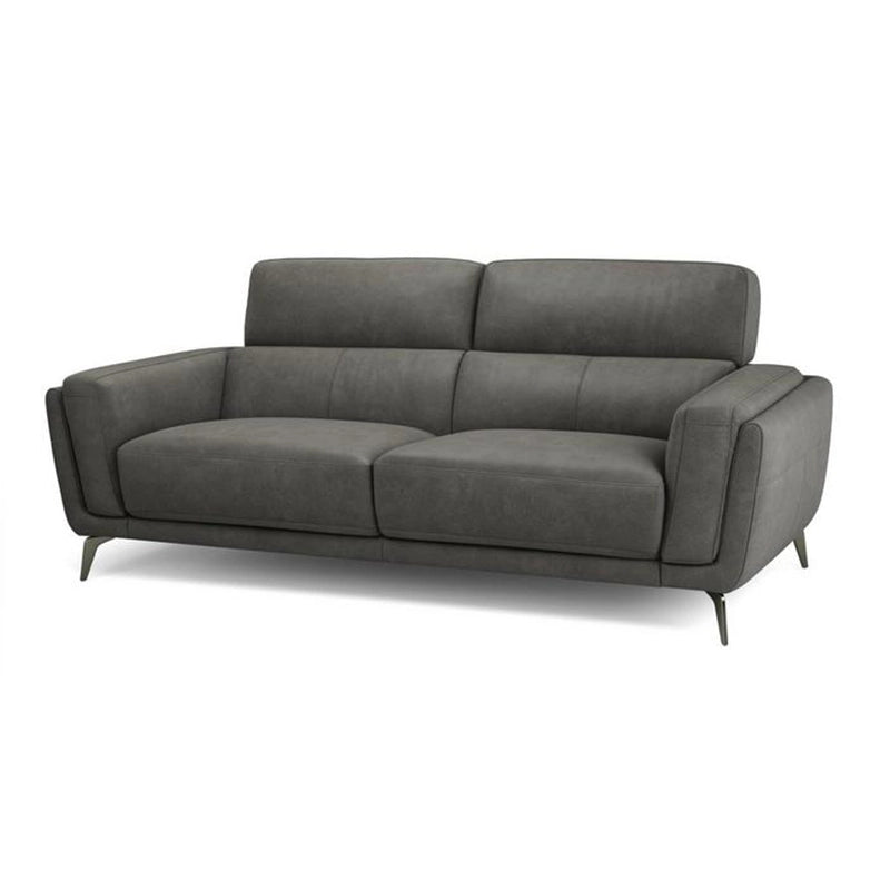 Structured backrests, box arms, and piped seams highlight its contemporary sofa design. 