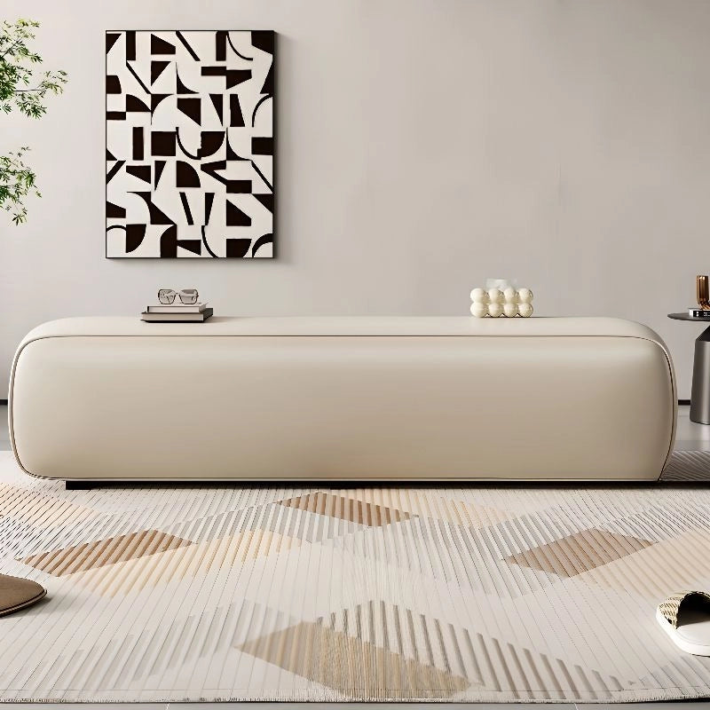 Sculptural bench photo with bench ottoman and bed bench cues in powder beige faux leather