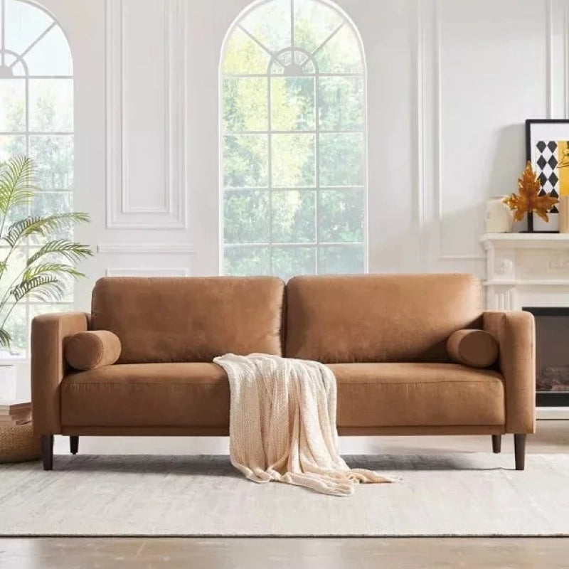 Syra 2 seater sofa crafted as a luxury fabric sofa with clean sofa design, elevated black legs, and refined living room sofa appeal for modern homes.