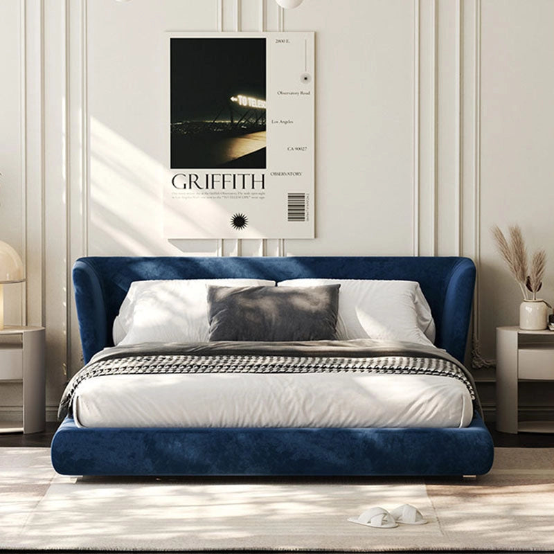 Low-profile padded platform base, modern bed design, bed frame, deep navy colour