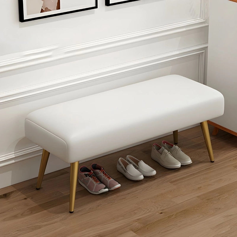 Gold-tipped gold legs in photo highlight bench seating and entryway bench detailing