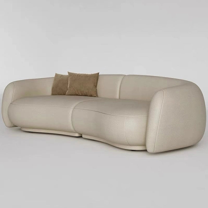 Creamy white kidney sofa designed as a luxury sofa and versatile set of sofa, featuring three seater couch comfort and elegant living room sofa styling for contemporary interiors.