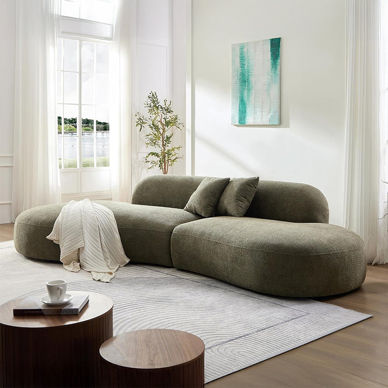 Wide view of designer sofa with living room couch and design of sofa – olive green