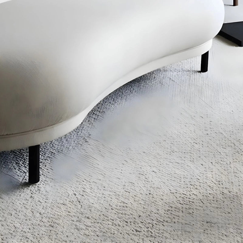 Designer bench sofa with minimalist style and soft contours for artistic interiors