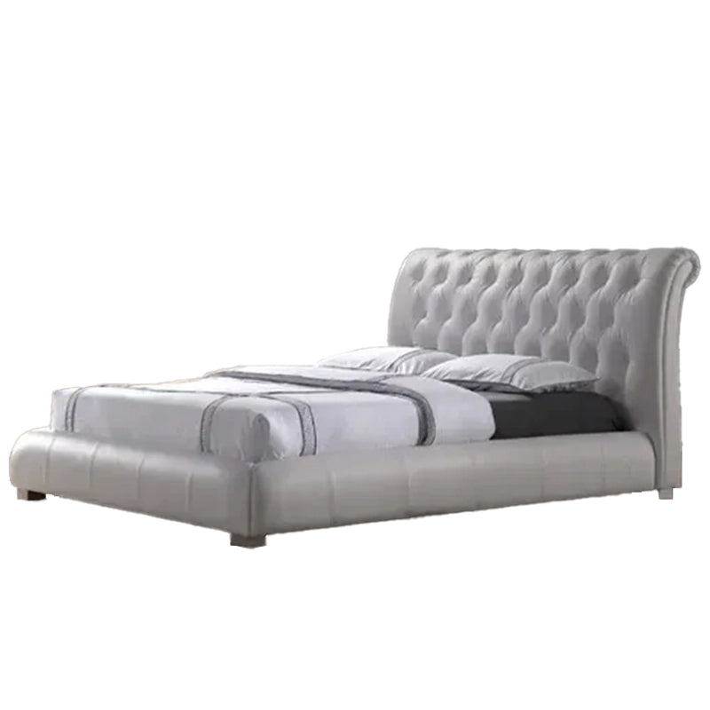Low-profile base with rolled footboard – new bed design – white faux leather