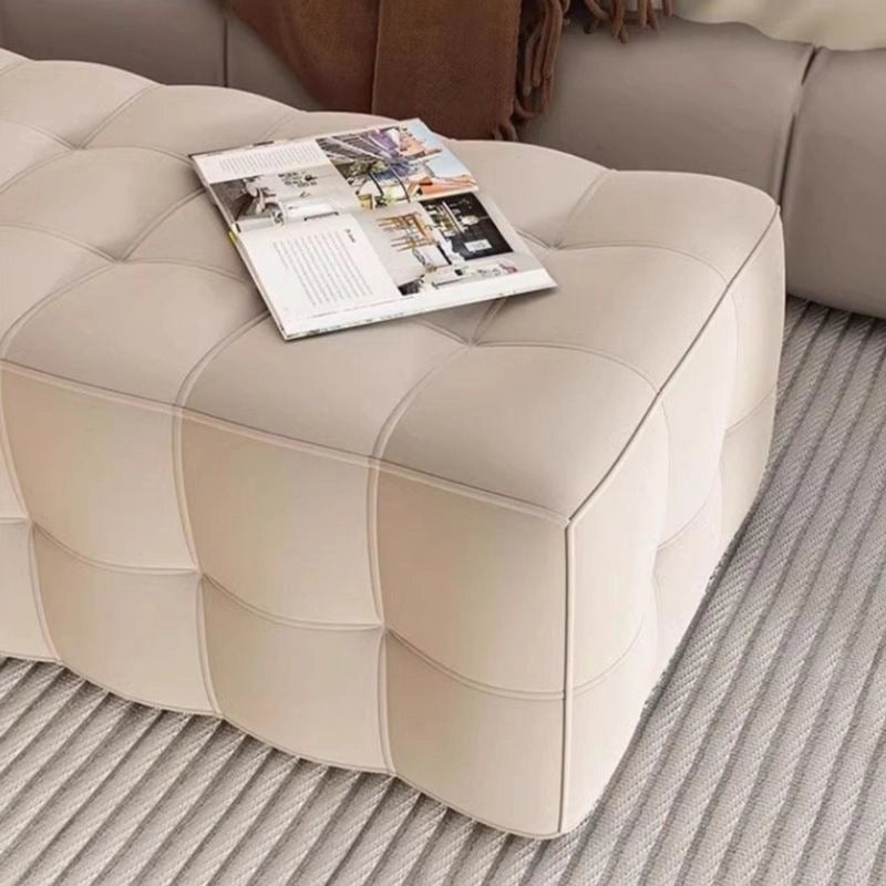 Stylish couch bench silhouette captured in luxurious faux suede finish and taupe palette