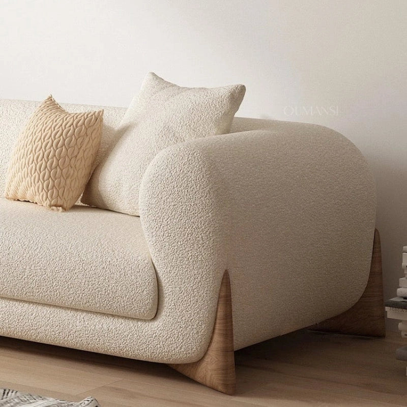 This elegant 3 seater couch combines Scandinavian influence with refined modernity, perfect for living rooms and studio lounges alike.